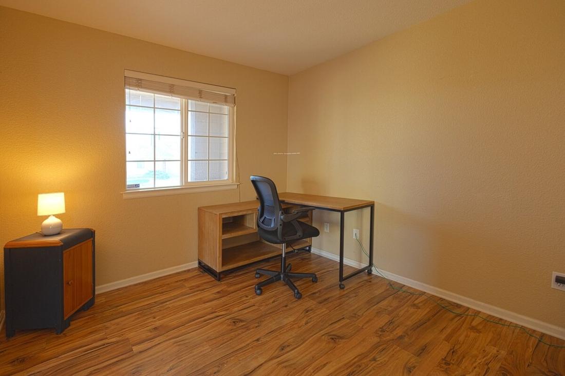 Quiet study with a desk and office chair